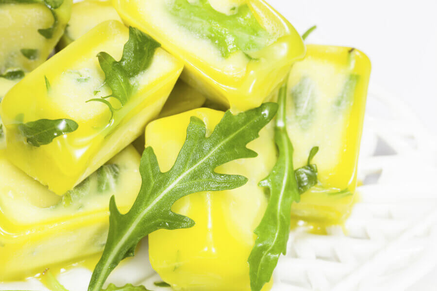 How do you freeze herbs in oil?